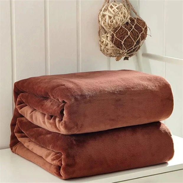 Coral fleece ærme tæppe