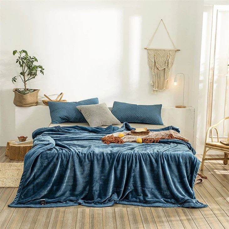 flannel blanket on the bed