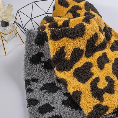 Leopard print sherpa stof